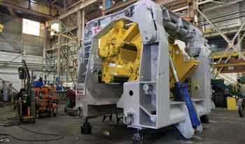 downcoiler for rolling mills